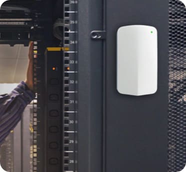 Cisco Meraki Sensor mounted on a server rack